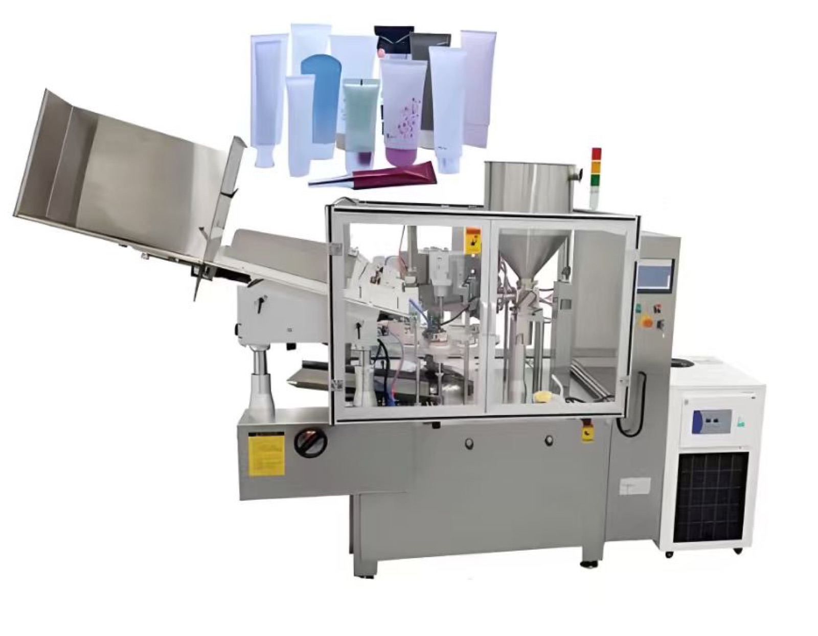 Tube filling and sealing machine